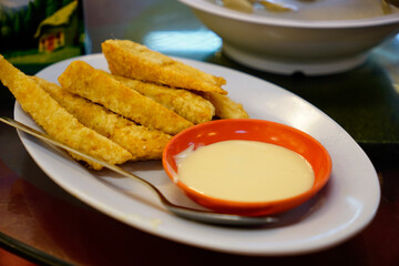 Crispy fried tofu served with mayonnaise sauce                             