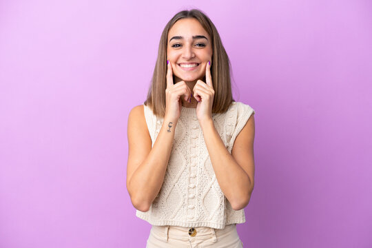 Young Caucasian Woman Isolated On Purple Background Smiling With A Happy And Pleasant Expression