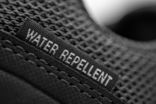 Close-up image of a black water repellent hiking boots 
