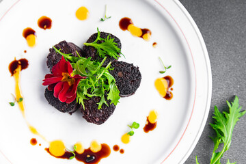 black pudding or bloody sausage healthy meal food snack on the table copy space food background rustic top view