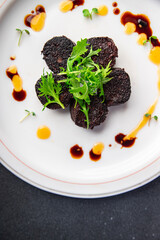 black pudding or bloody sausage healthy meal food snack on the table copy space food background...