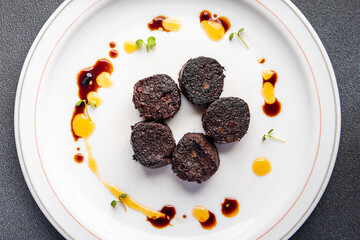 black pudding or bloody sausage healthy meal food snack on the table copy space food background rustic top view