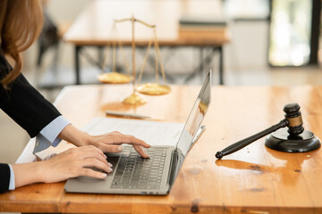 Lawyers having  Concepts of  Legal services at the law office work Legal advice online on computer labor law