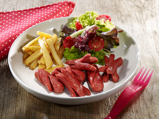 sausages, salad and potato chips
