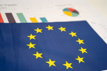 EU flag on graph background, Business and finance concept.