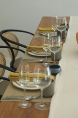 Dining table with decorated kitchen utensils