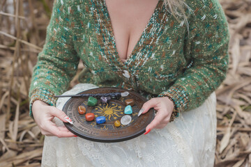 Concept of divination Hippie woman, energy and other magical scene at nature, time...