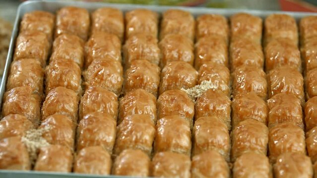 Traditional turkish baklava pistachio pastry. Dilberdudagi, ozel kesim baklava, cikolatali baklava, fistikli baklava, katmer, fistikli kadayif, kattafi, fistik sarma, soguk baklava, midye baklava, cev