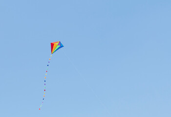 Colorful kite on a sunny day. - 563056698