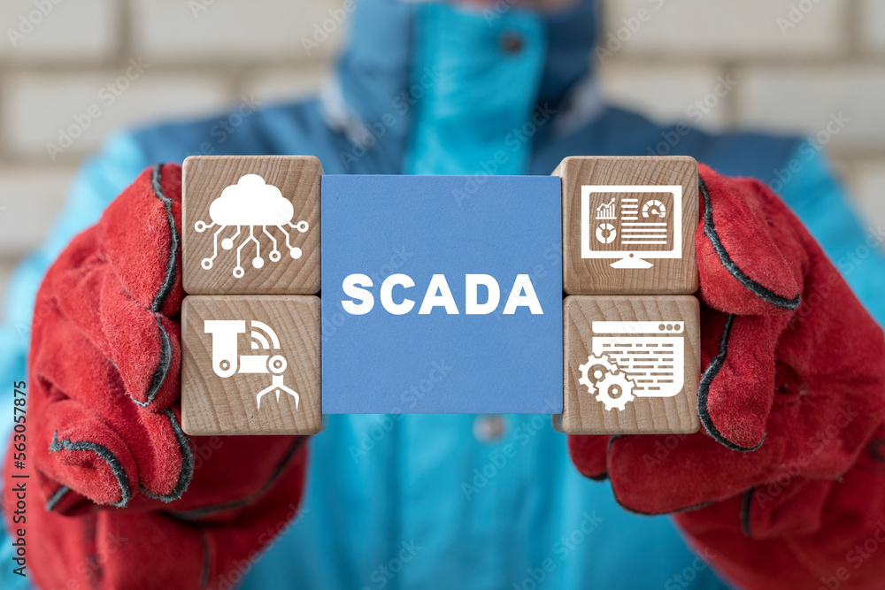 Aufkleber worker or engineer presents colorful cubes with conceptual banner: scada. scada supervisory control 