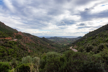 Obraz premium Scenic Road in the Mountains on the Sea Coast. Near Foxi Manna, Sardinia, Italy.