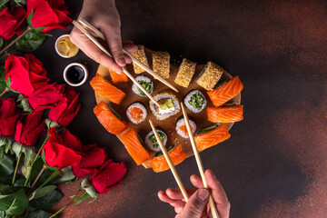 Heart shaped Valentine day sushi set. Classic sushi rolls, philadelphia, maki set for two, with two...