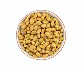 Steamed soy beans, or Edamame, in a ceramic bowl on white background.