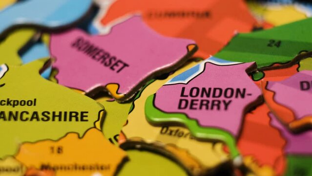 England Map Puzzle Blocks with Great Britain  Cities. Close-Up Video Background, Dolly Footage.