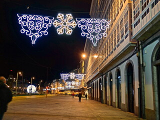Fototapeta premium Christmas lighting in 'Avenida de la Marina', in the city of Coruna