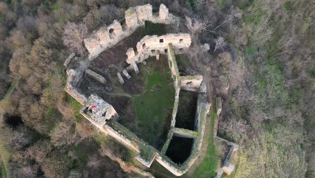 Flight over Soimos medieval fortress, built in 1278, Romania, Arad, Romania.