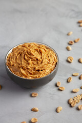 Yummy Organic Peanut Butter in a Bowl, low angle view. Copy space.