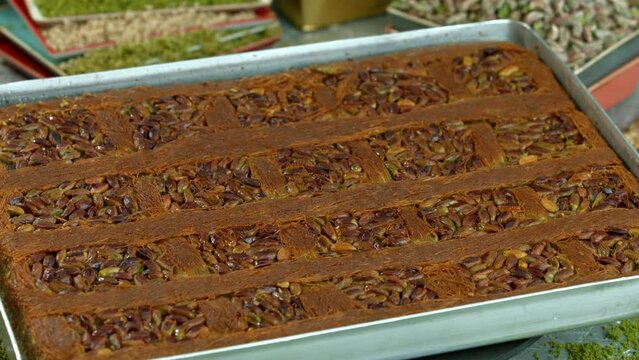 Traditional turkish baklava pistachio pastry. Dilberdudagi, ozel kesim baklava, cikolatali baklava, fistikli baklava, katmer, fistikli kadayif, kattafi, fistik sarma, soguk baklava, midye baklava, cev