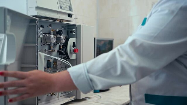 man scientist testing chemical mixing stirrer. Spbd add powder to rotating water. pharmaceutical lab. concept biotechnology, experiment, tool. development of new drugs