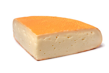 Piece of fresh Chaumes cheese close up isolated on white background