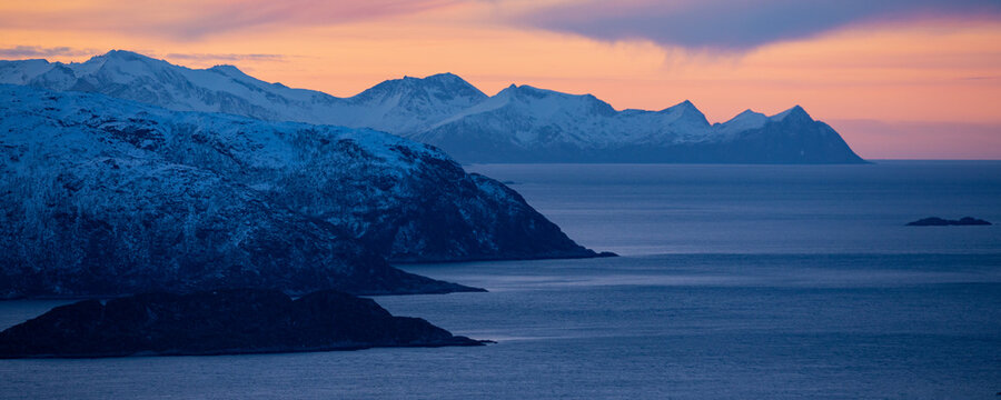 Beautiful panoramic view of fjord and landscape at sunset near Tromso, Norway