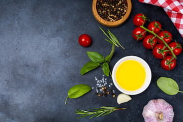 Food background from vegetable, spices, herb on black table