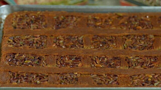 Traditional turkish baklava pistachio pastry. Dilberdudagi, ozel kesim baklava, cikolatali baklava, fistikli baklava, katmer, fistikli kadayif, kattafi, fistik sarma, soguk baklava, midye baklava, cev