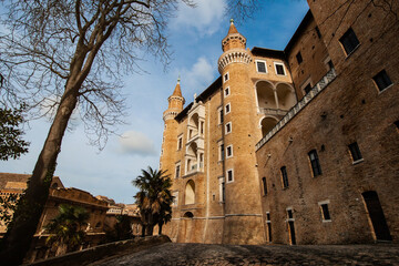 Fototapeta na wymiar The Ducal Palace Urbino is a Renaissance building and It was built for Duke Federico da Montefeltro, also know as Federico III da Montefeltro. The Palace is listed as UNESCO World Heritage Site