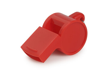 closeup of red plastic whistle isolated - 563087823