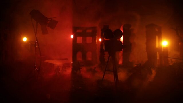 Action (War) movie concept. Man moving out with little boy from burned out city destroyed in war. Military fighting silhouettes. Selective focus