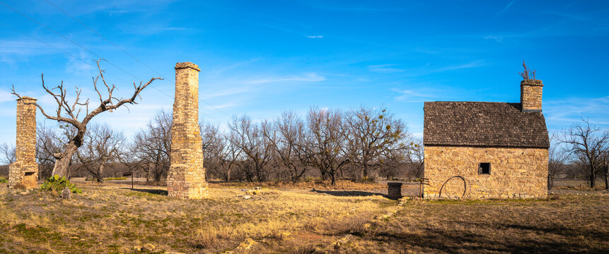 Historic Fort Phantom Hill in Abilene, Texas, USA, tranquil winter landscape with stone house and chimneys