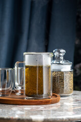 Green tea with mint in french press. Healthy drink, detox drinking.