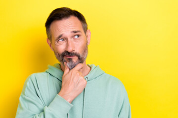 Portrait photo of old retired middle mature age man touch chin pouted lips look empty space choose...