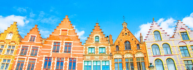 Naklejka premium Colorful houses on Brugge Grote Markt square, Belgium