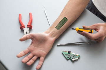 Bionic microchip inside human body - future technology and cybernetics concept.
