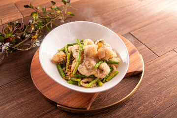 Crispy Fried Boneless Fish with Salt and Pepper served dish isolated on wooden table top view of Hong Kong food