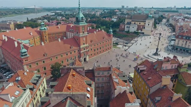 aerial view of Warsaw old town, historical centre of Warsaw at sunrise, flying above Warsaw royal castle, capital of Poland, tourism in Eastern Europe. High quality 4k footage