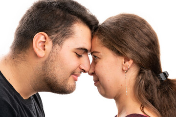 Obraz premium Close-up of cute male and female couple faces together
