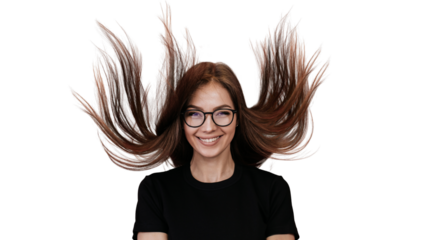 Indoor shoot of Italian woman in spectacles and black t-shirt with fluttering long loose hair in air, broad smiling, looks satisfied by health over transparent background. People emotions, healthcare