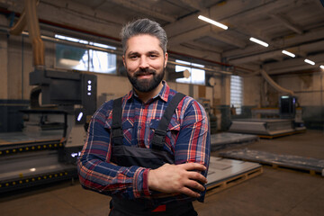 Handsome adult man working in the warehouse