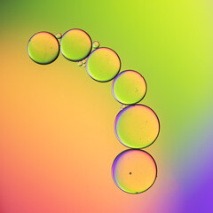 Macro Photography and creative diffuse lighting was used to frame these colorful oil droplets.  Thank you for looking.