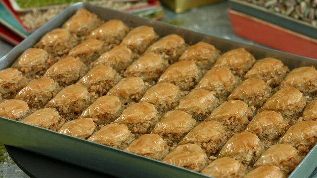 Traditional turkish baklava pistachio pastry. Dilberdudagi, ozel kesim baklava, cikolatali baklava, fistikli baklava, katmer, fistikli kadayif, kattafi, fistik sarma, soguk baklava, midye baklava, cev