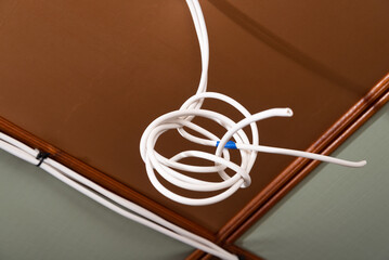 installation of electrical wires on the ceiling