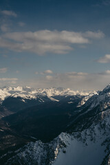Snowy mountains. Sunny winter day. Amazing snow covered peaks in the Sochi, Russia.