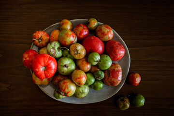 Colorful autumn vegetables on white plate