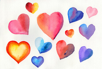 Many hearts of different sizes and coloring made in watercolor on textured white paper.