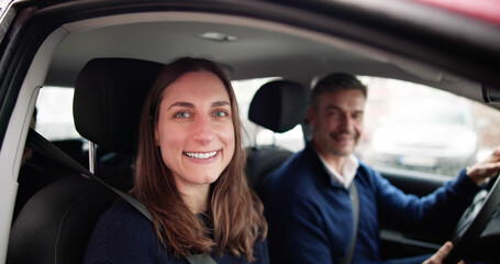 Smiling People Sitting Inside The Ride Sharing