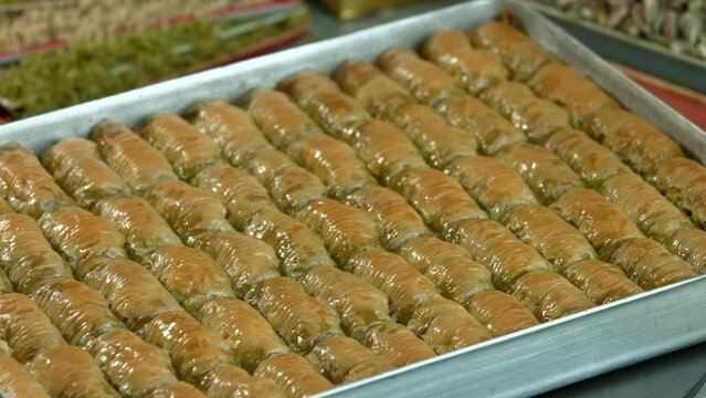 Traditional turkish baklava pistachio pastry. Dilberdudagi, ozel kesim baklava, cikolatali baklava, fistikli baklava, katmer, fistikli kadayif, kattafi, fistik sarma, soguk baklava, midye baklava, cev