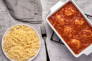 Food photography of meatballs, tagliatelle; pasta, minced, beef, chicken, pork, meat, tomato sauce