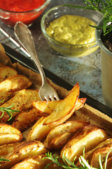 A tray with potatoes backed in oven